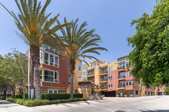 a view of a house with a large window