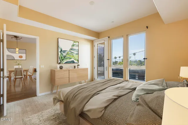 a view of a bathroom from a hallway with toilet