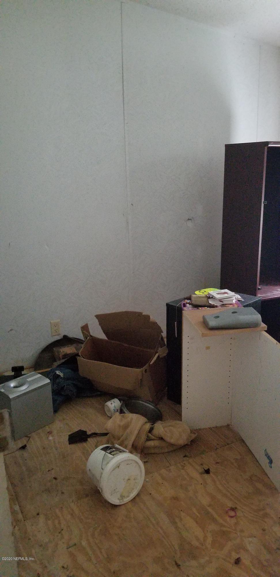 14003 Bradham Road Jacksonville, FL 32226 - Photo 29 of 30 a bathroom with a sink and a toilet