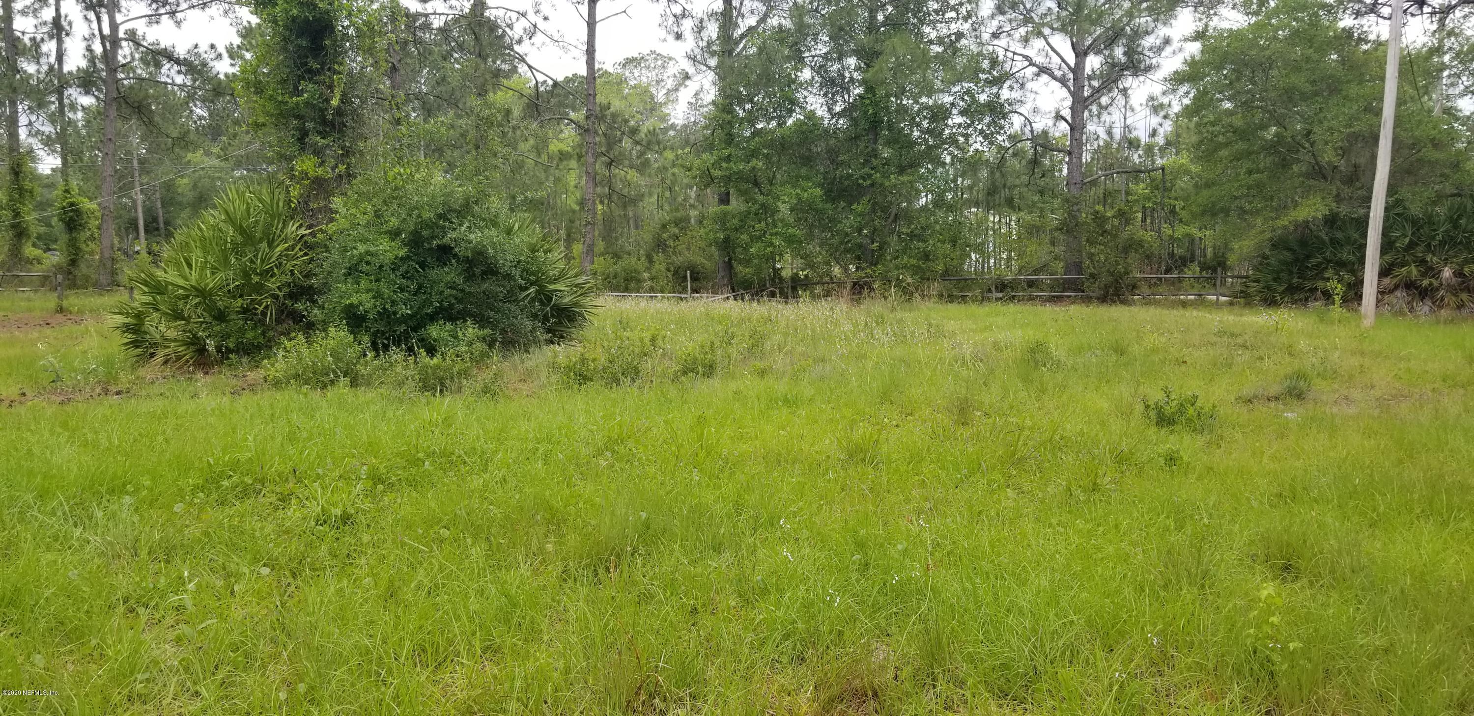 14003 Bradham Road Jacksonville, FL 32226 - Photo 9 of 30 a view of a green field