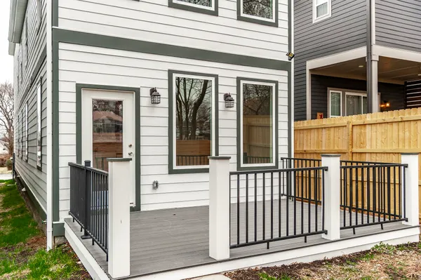 a view of a brick building with many windows