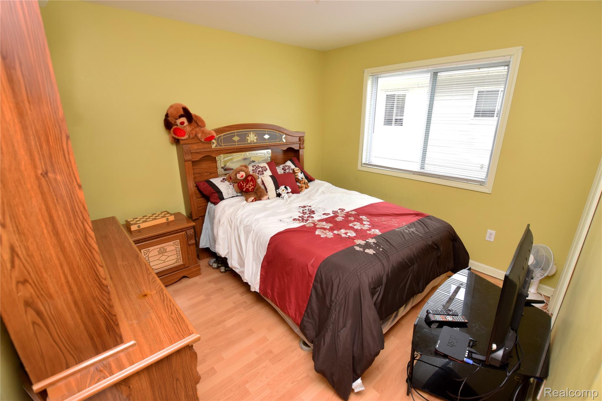 4301 Pengelly Road Flint, MI 48507 - Photo 6 of 16 Bedroom with light wood finished floors