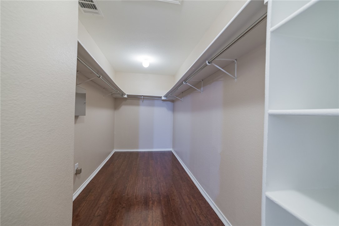 11228 Pickard Lane Austin, TX 78748 - Photo 27 of 32 a view of hallway with wooden floor