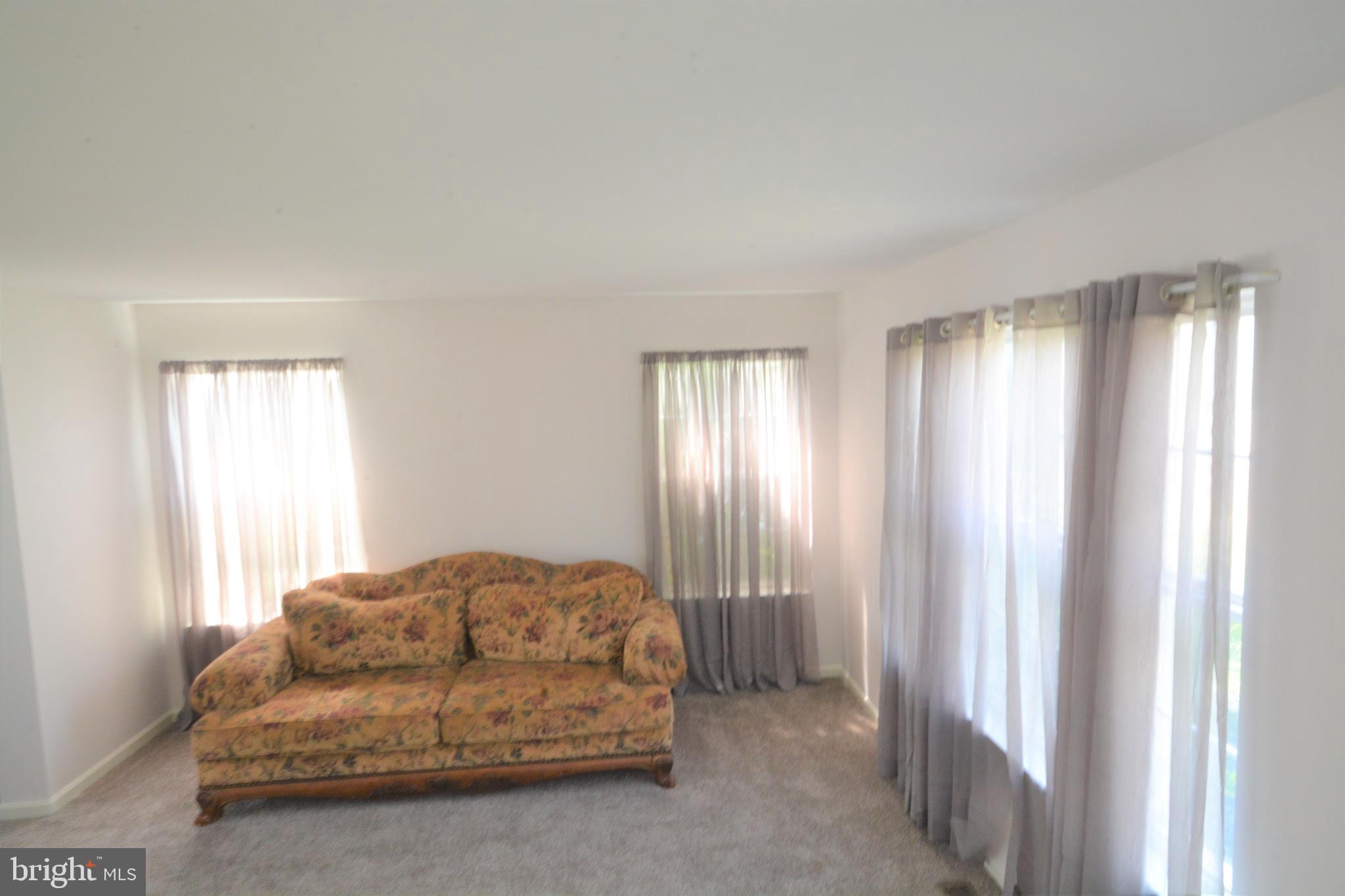 856 Frosty Hollow Road Langhorne, PA 19047 - Photo 5 of 49 Living room with new carpets and freshly painted