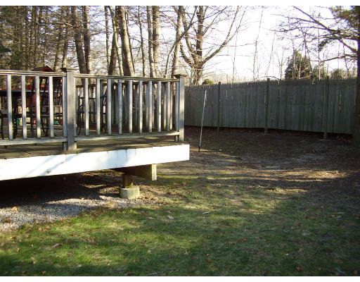 93 Spiers Road Newton, MA 02459 - Photo 11 of 11 a view of a backyard with wooden fence