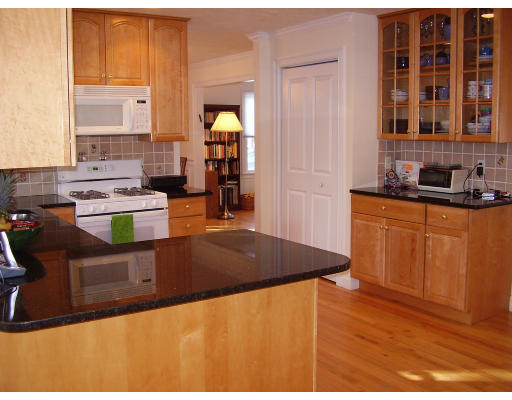 93 Spiers Road Newton, MA 02459 - Photo 3 of 11 a kitchen with a sink and cabinets