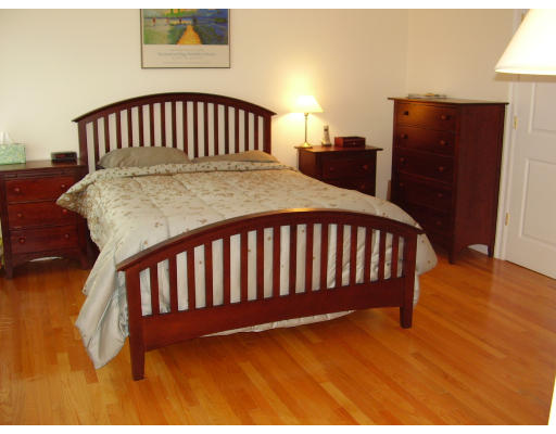93 Spiers Road Newton, MA 02459 - Photo 9 of 11 a view of a bedroom with wooden floor