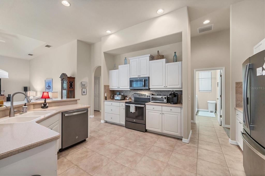 4 Windward Way Placida, FL 33946 - Photo 17 of 39 a large kitchen with stainless steel appliances lots of counter top space