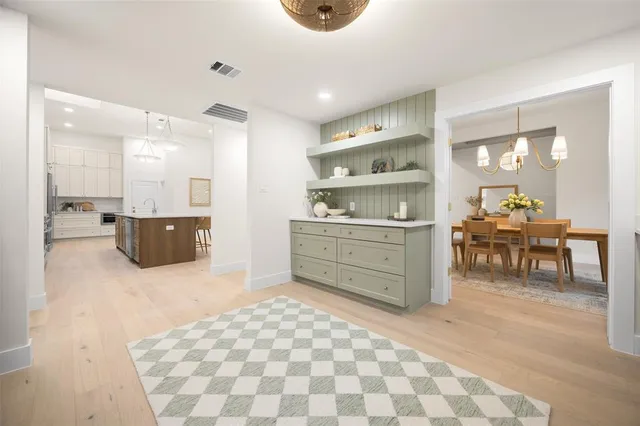 a room with a cabinets and a wooden floor