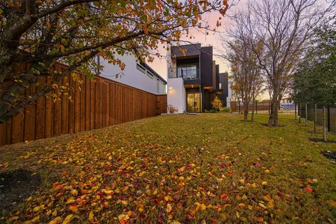 a view of houses with swimming pool