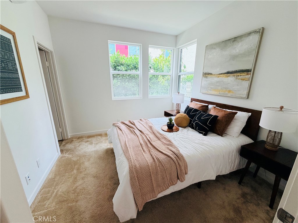 771 South Grable Circle Orange, CA 92868 - Photo 11 of 18 a bedroom with bed and window