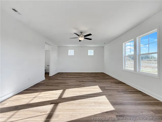 a view of an empty room and window