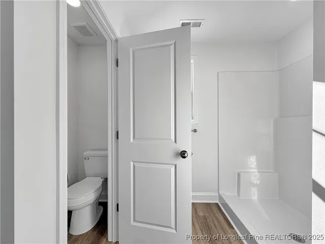 a view of a big room with an empty space