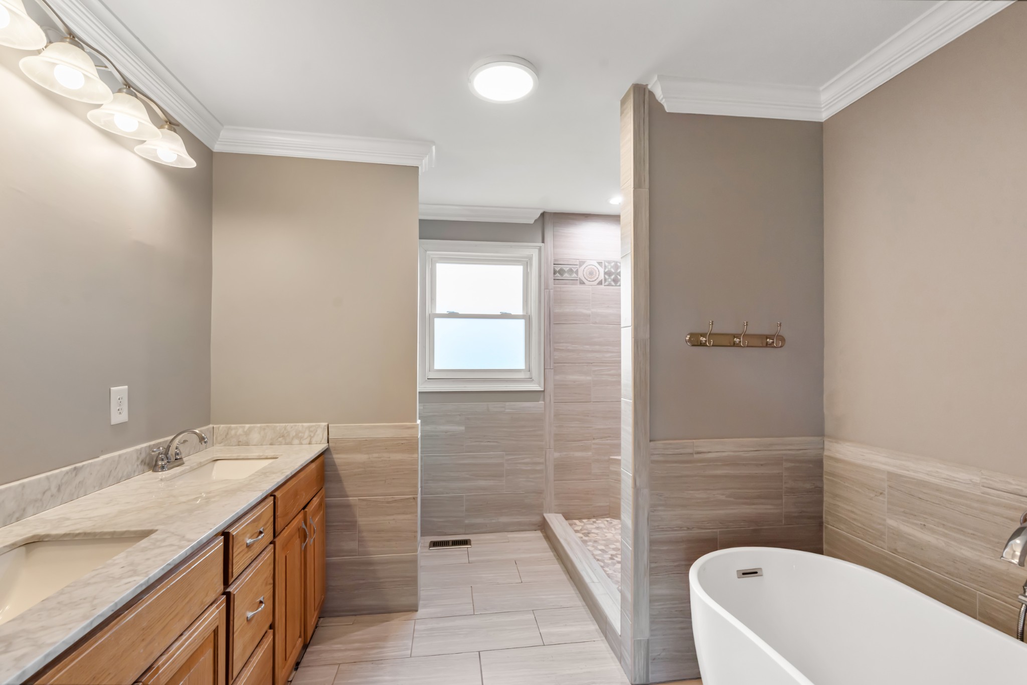 4602 Washington Road Springfield, TN 37172 - Photo 24 of 63 a bathroom with a granite countertop sink toilet and shower