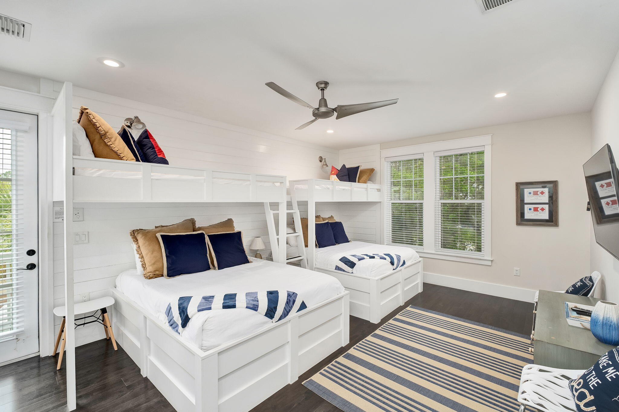 2846 South County Highway 395 Santa Rosa Beach, FL 32459 - Photo 14 of 19 a bedroom with furniture and a fireplace