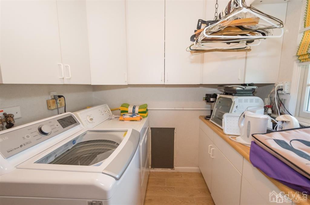 6 Tripplet Road Somerset, NJ 08873 - Photo 17 of 30 a utility room with dryer and washer