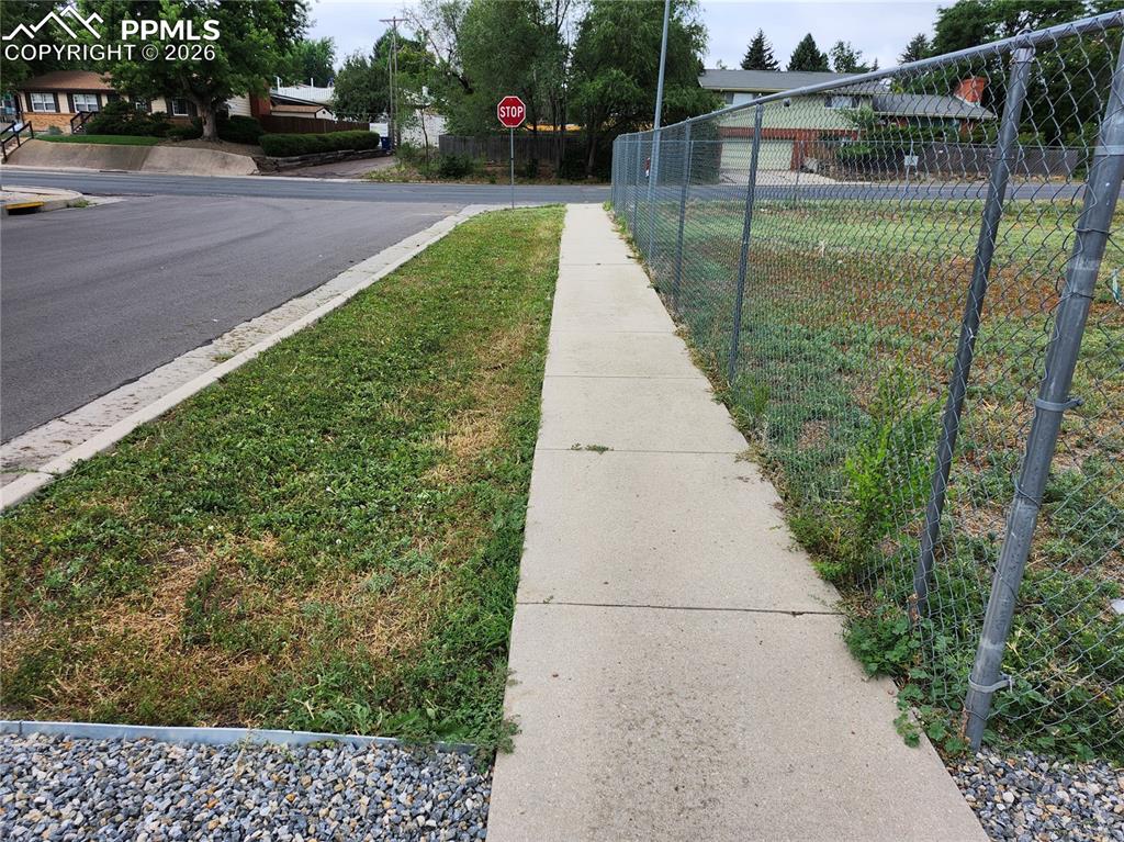 1504 Tweed Street Colorado Springs, CO 80909 - Photo 2 of 6 a view of a backyard with sitting area