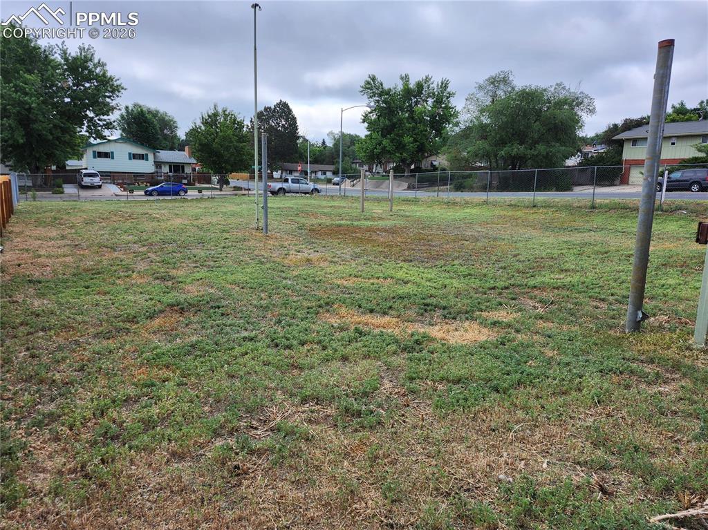 1504 Tweed Street Colorado Springs, CO 80909 - Photo 5 of 6 a view of a garden