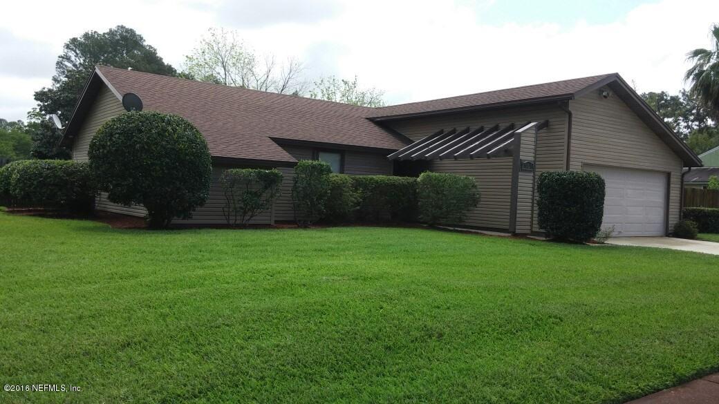 10823 Reading Road Jacksonville, FL 32257 - Photo 1 of 21 a front view of house with a garden