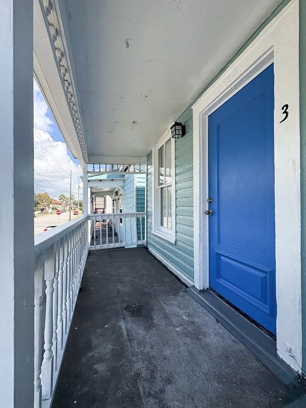 1810 24th Street Rear, Unit 3 Galveston, TX 77550 - Photo 2 of 8 a view of hallway with stairs