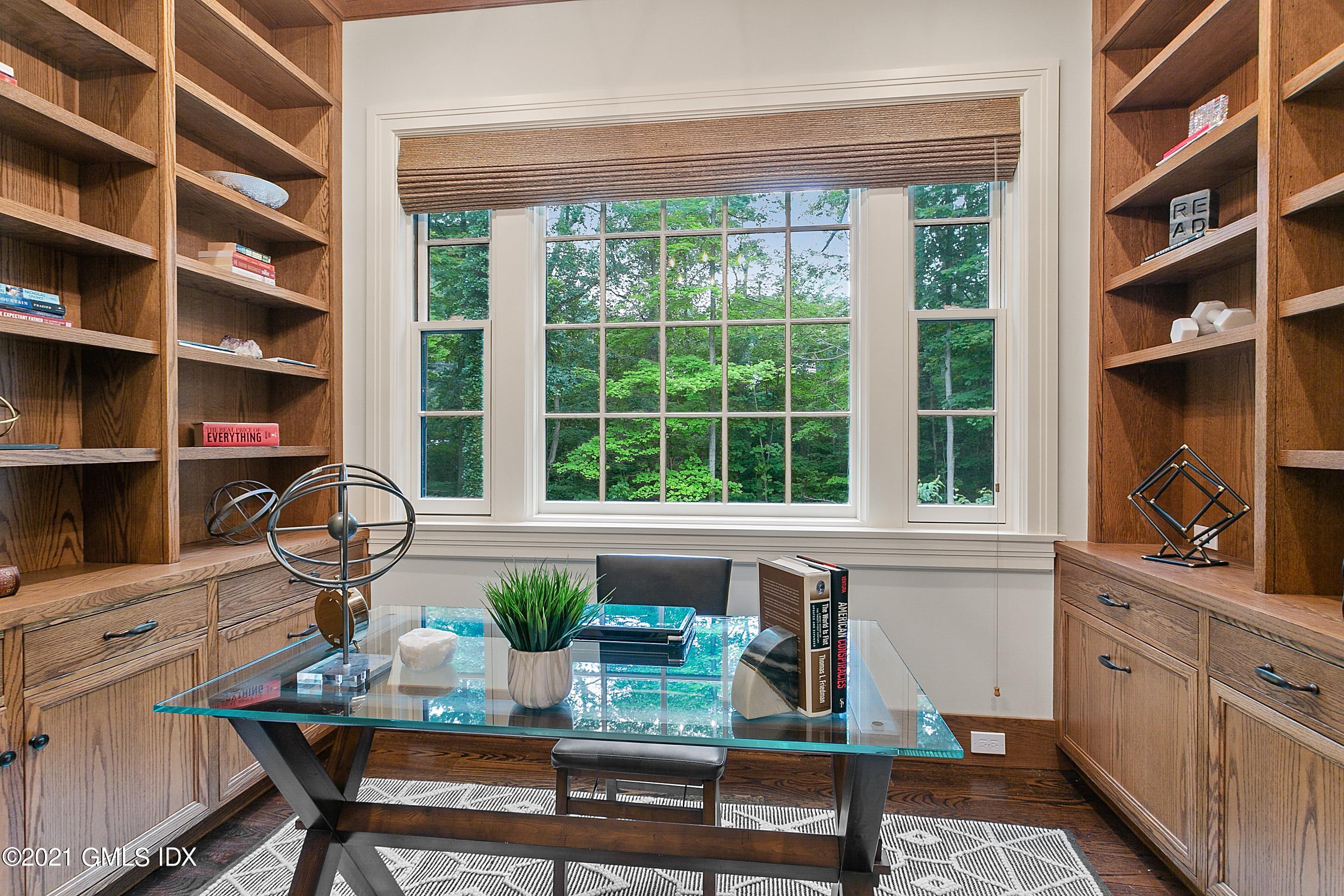 125 Cat Rock Road Cos Cob, CT 06807 - Photo 12 of 45 a workspace with furniture and a window