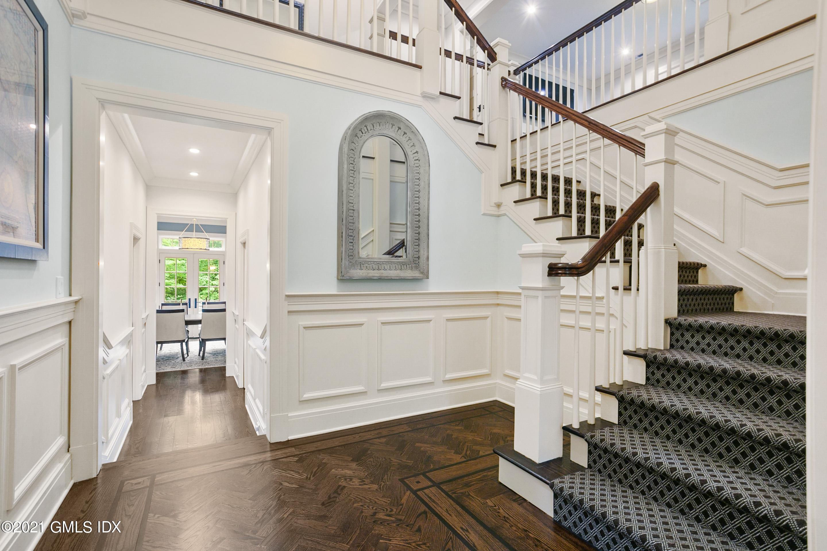 125 Cat Rock Road Cos Cob, CT 06807 - Photo 13 of 45 a view of entryway and hall with wooden floor