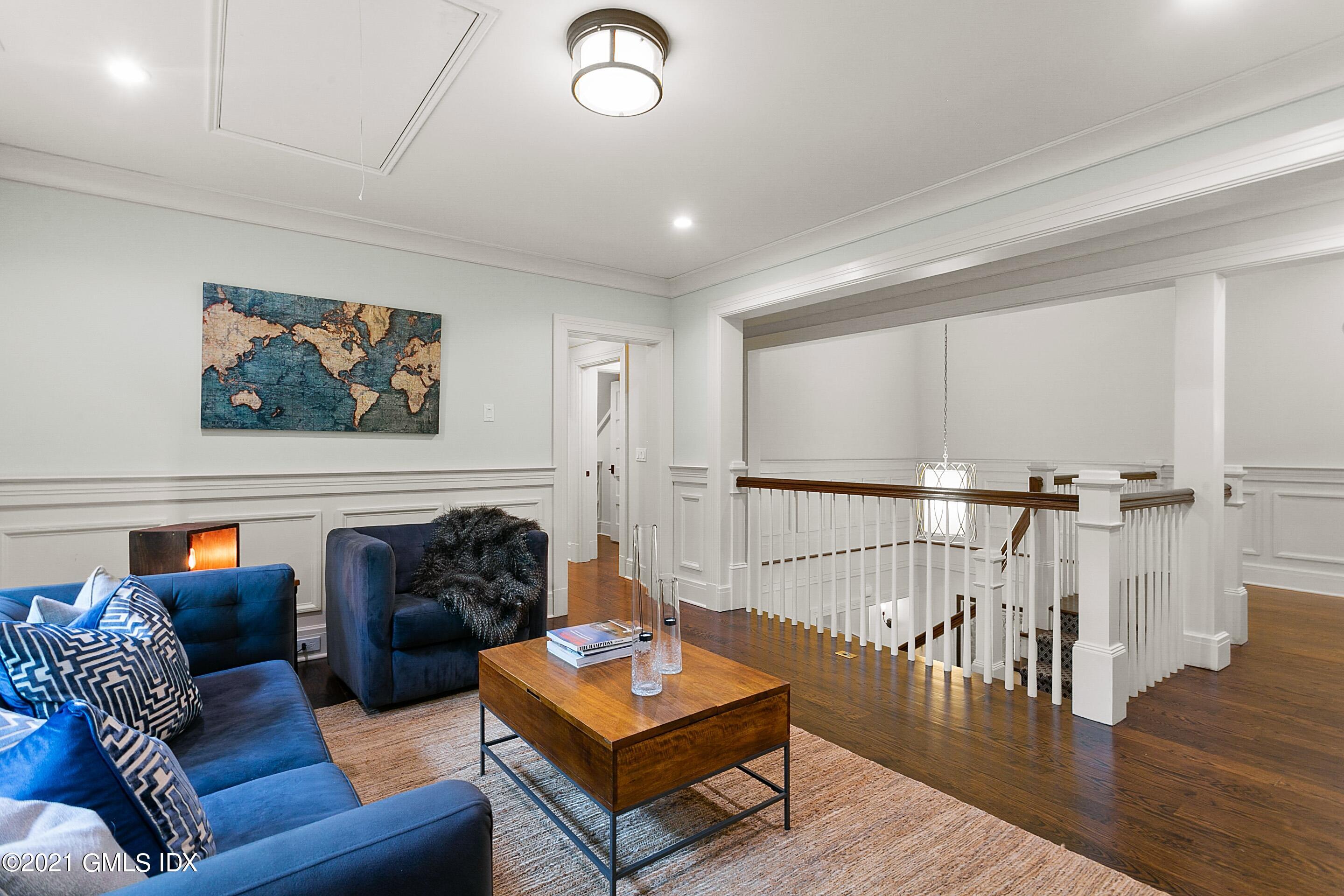 125 Cat Rock Road Cos Cob, CT 06807 - Photo 14 of 45 a living room with furniture