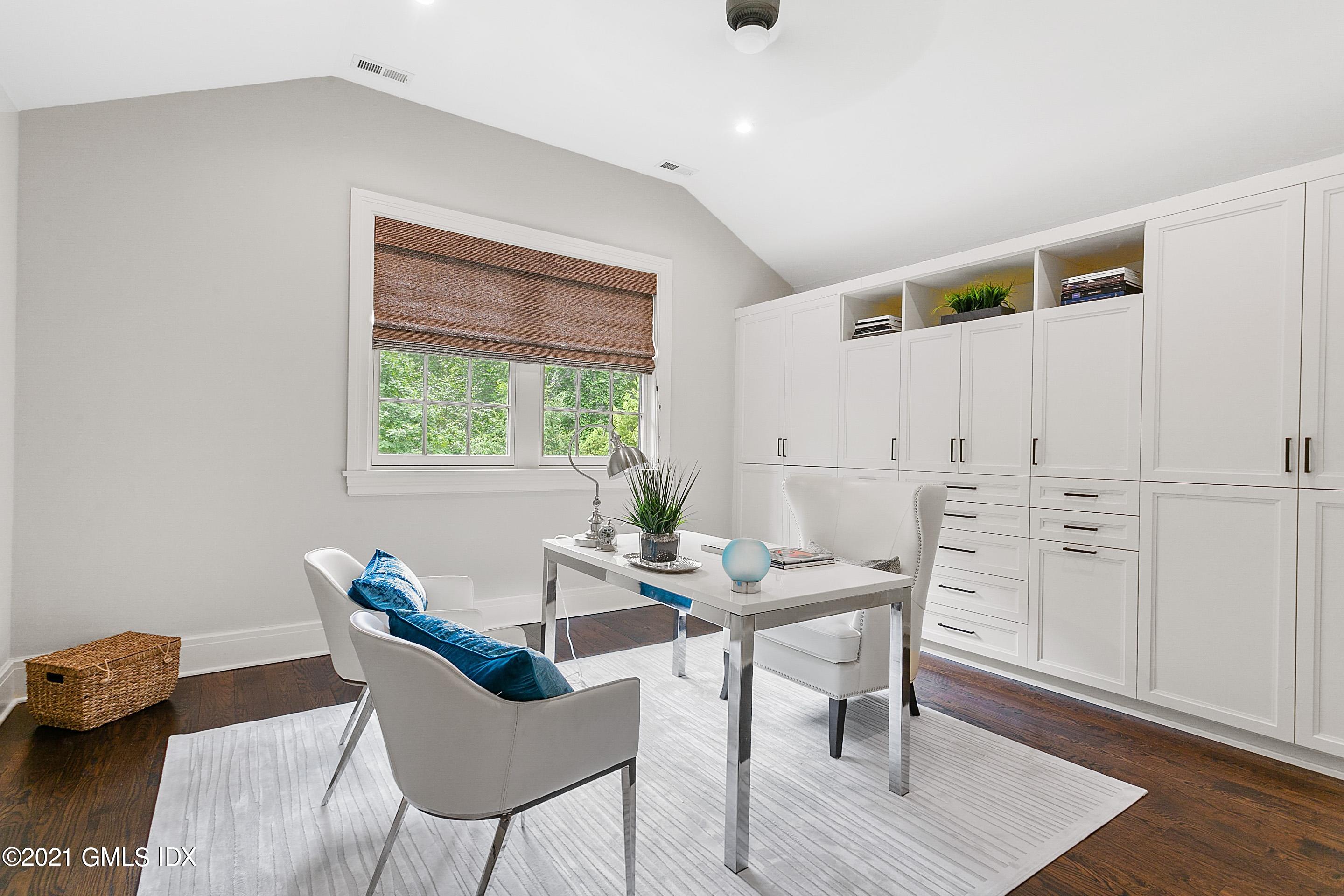 125 Cat Rock Road Cos Cob, CT 06807 - Photo 22 of 45 a view of a dining room with furniture and wooden floor