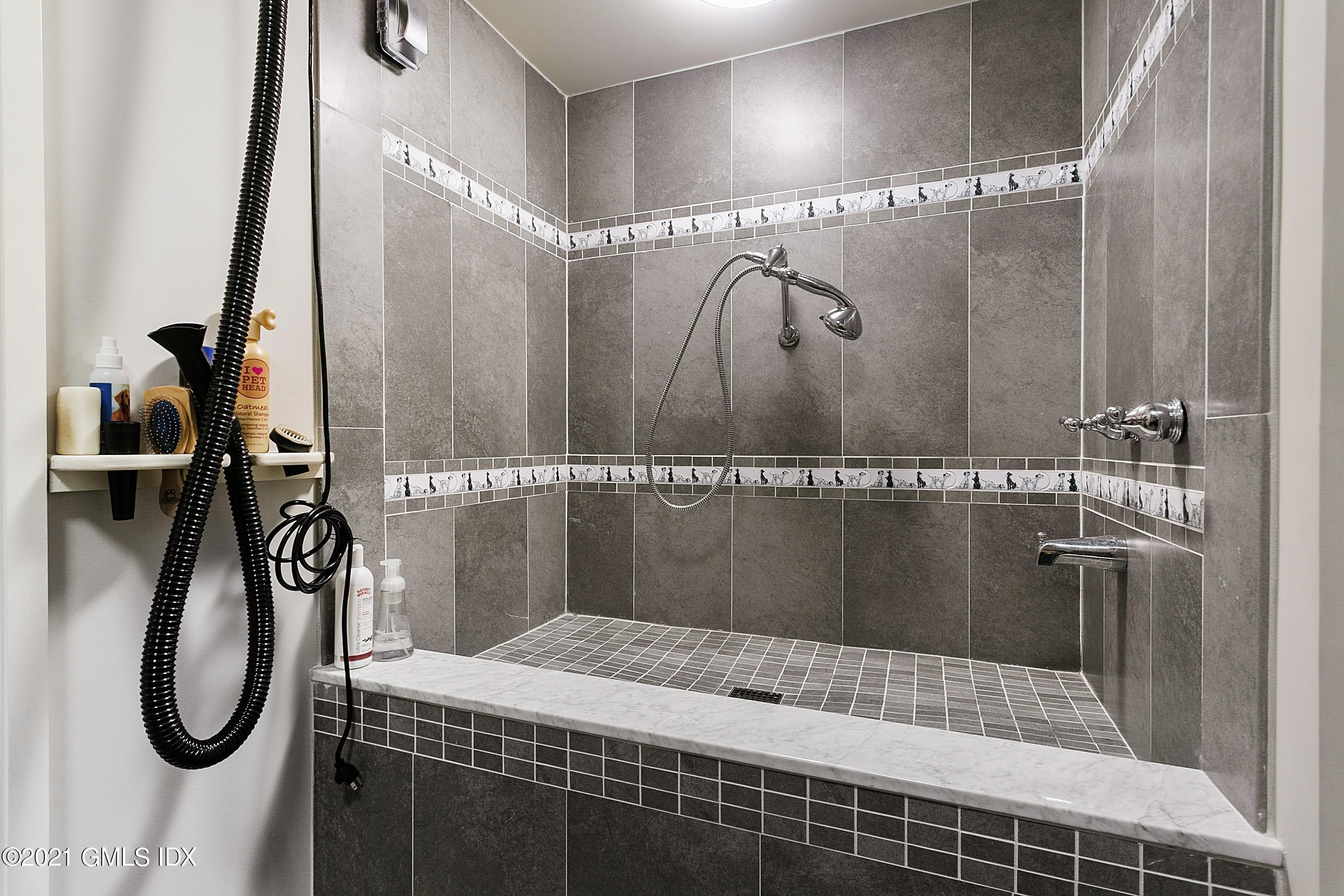 125 Cat Rock Road Cos Cob, CT 06807 - Photo 34 of 45 a bathroom with a shower