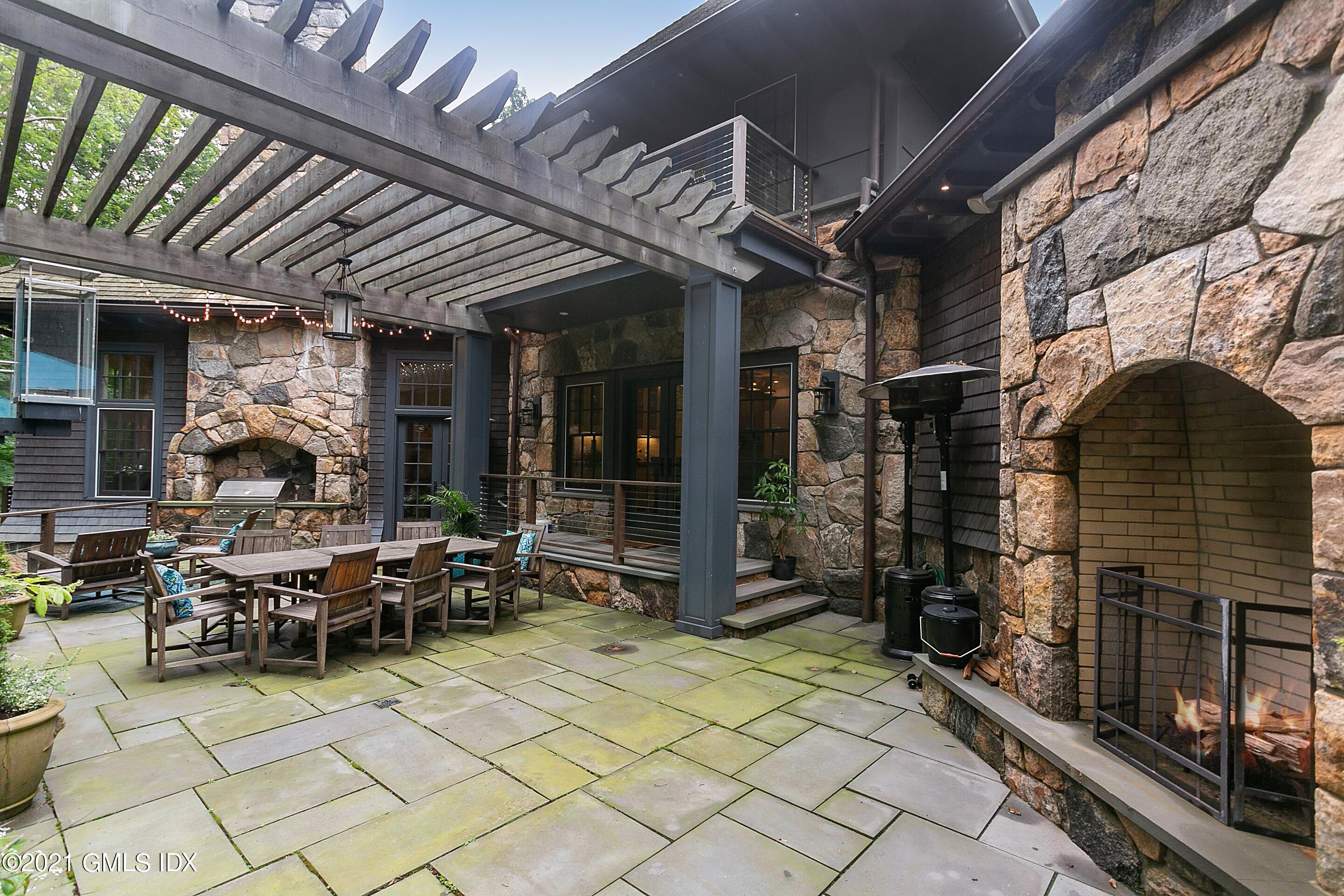 125 Cat Rock Road Cos Cob, CT 06807 - Photo 35 of 45 a view of a porch with furniture