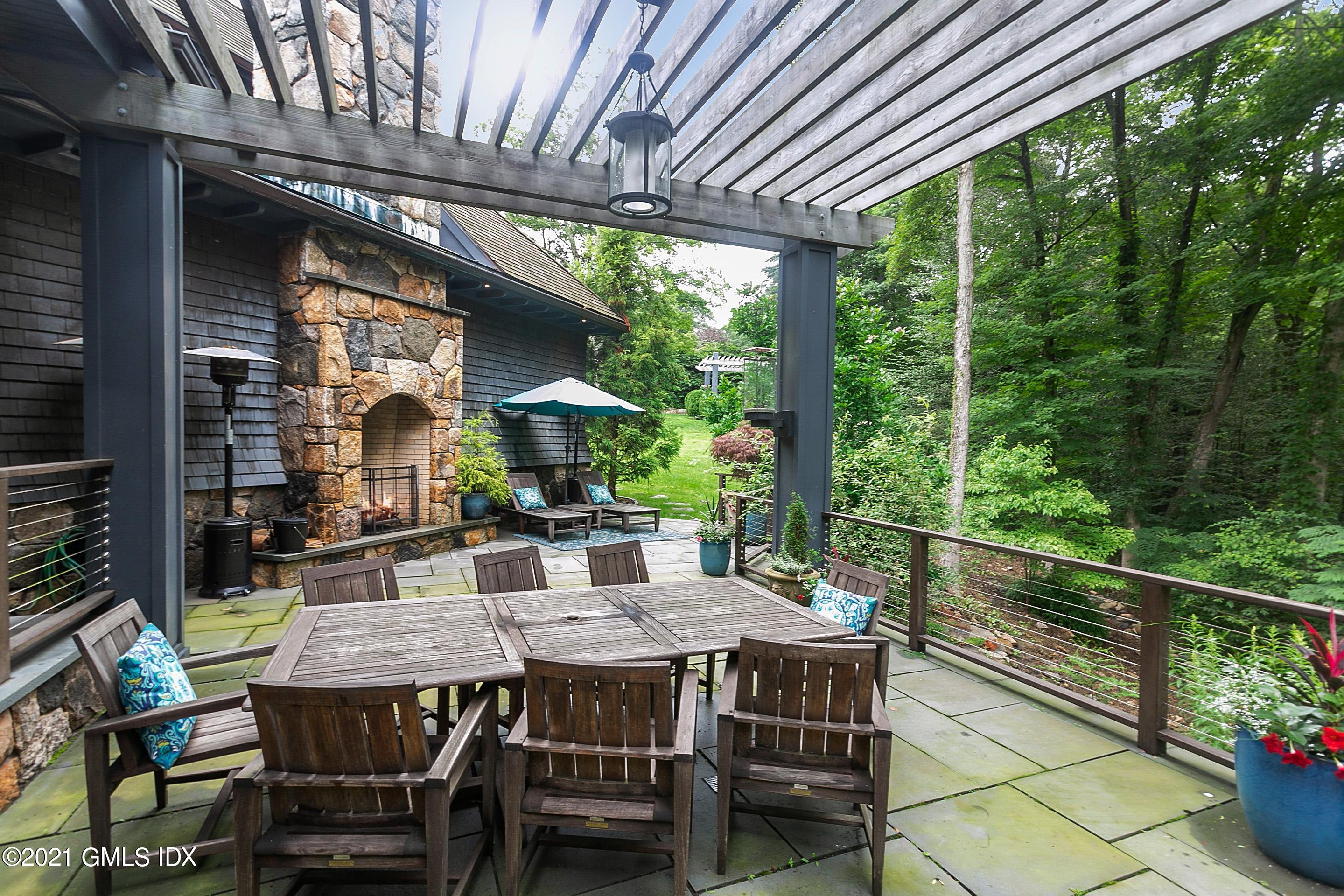 125 Cat Rock Road Cos Cob, CT 06807 - Photo 37 of 45 a view of an outdoor dining space with furniture