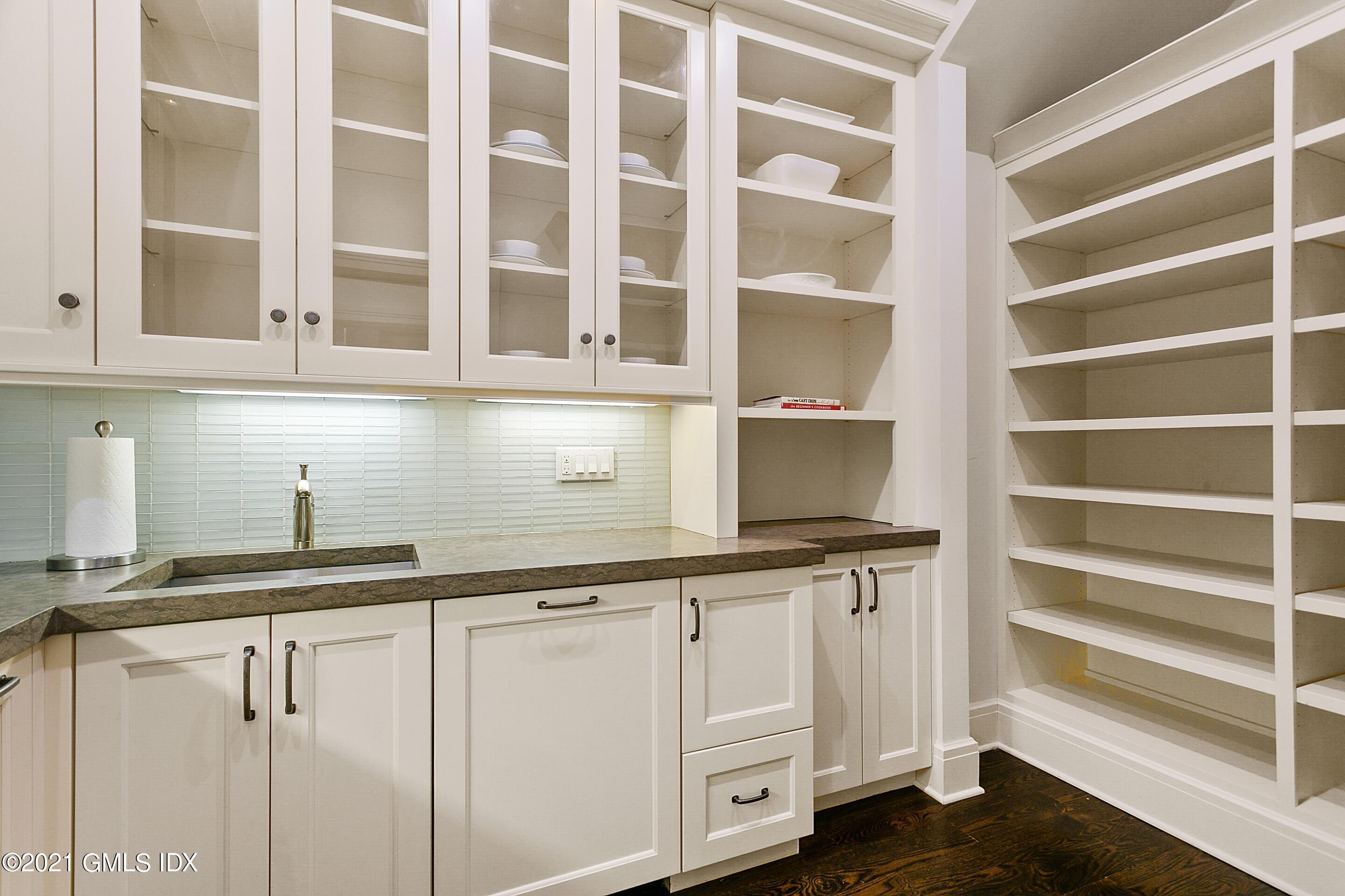 125 Cat Rock Road Cos Cob, CT 06807 - Photo 8 of 45 a view of cabinets and window