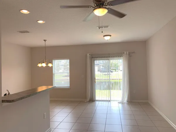 a view of an empty room and window