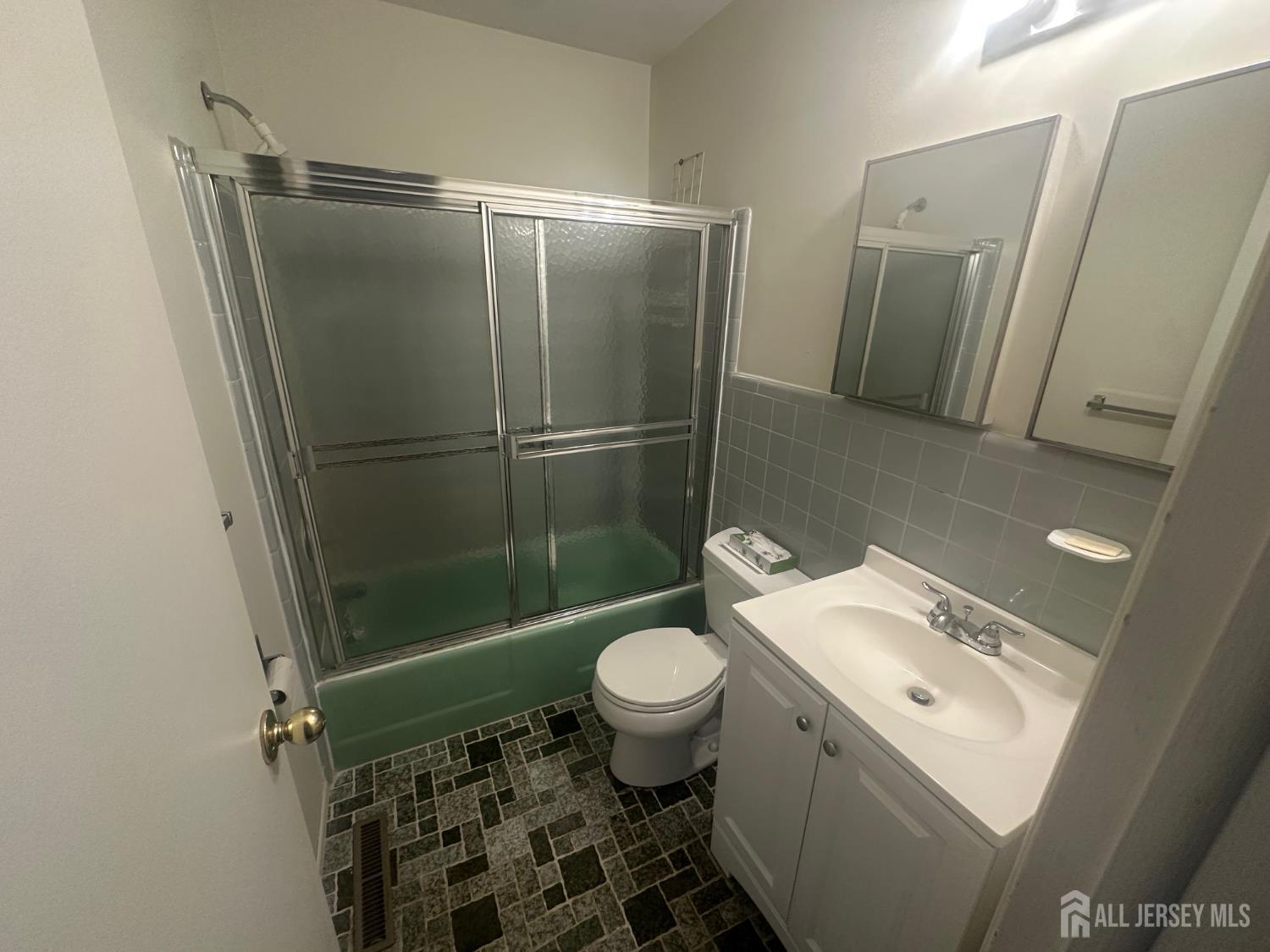 22 Richford Road Kendall Park, NJ 08824 - Photo 11 of 23 a bathroom with a granite countertop sink toilet and shower
