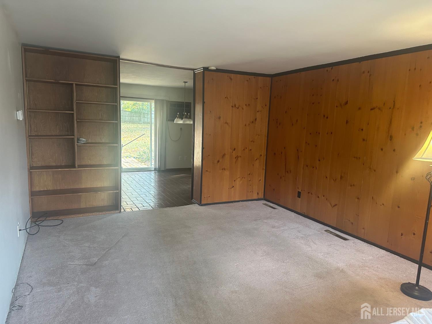 22 Richford Road Kendall Park, NJ 08824 - Photo 2 of 23 an empty room with shelves