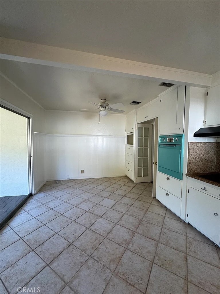 1852 Alpha Road Glendale, CA 91208 - Photo 11 of 29 a view of a kitchen with white cabinets