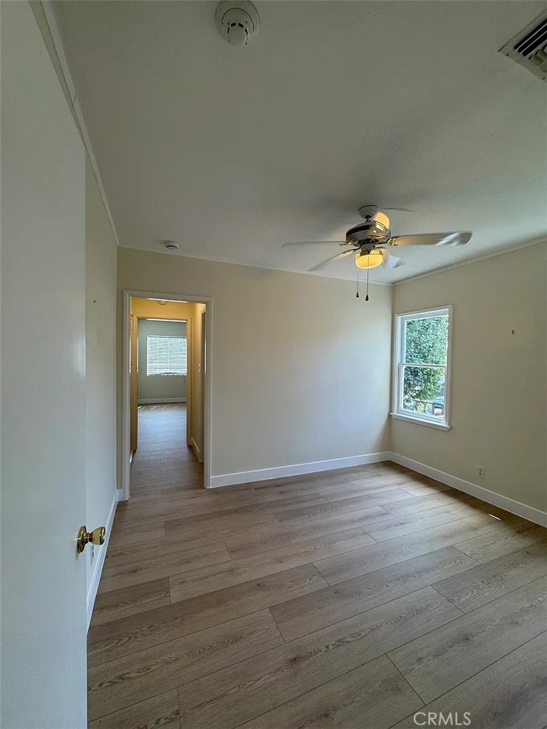 1852 Alpha Road Glendale, CA 91208 - Photo 20 of 29 wooden floor in an empty room with a window