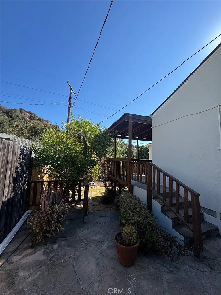 1852 Alpha Road Glendale, CA 91208 - Photo 24 of 29 a view of a porch with furniture and a yard