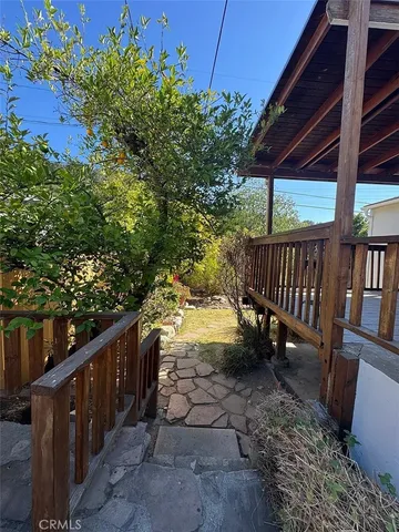 a view of stairs and a yard