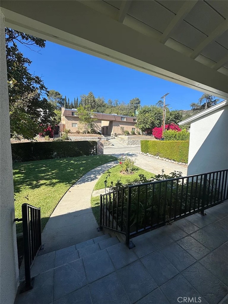 1852 Alpha Road Glendale, CA 91208 - Photo 4 of 29 a view of a balcony with an outdoor space and seating area
