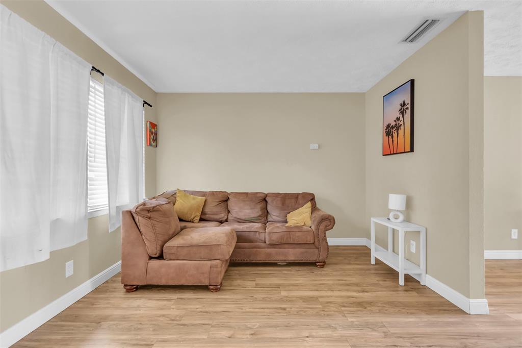 2311 Arcady Lane Lancaster, TX 75134 - Photo 5 of 22 a living room with furniture and a large window