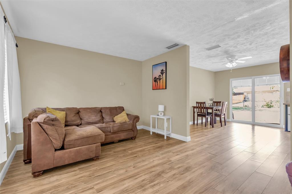 2311 Arcady Lane Lancaster, TX 75134 - Photo 6 of 22 a living room with furniture and wooden floor