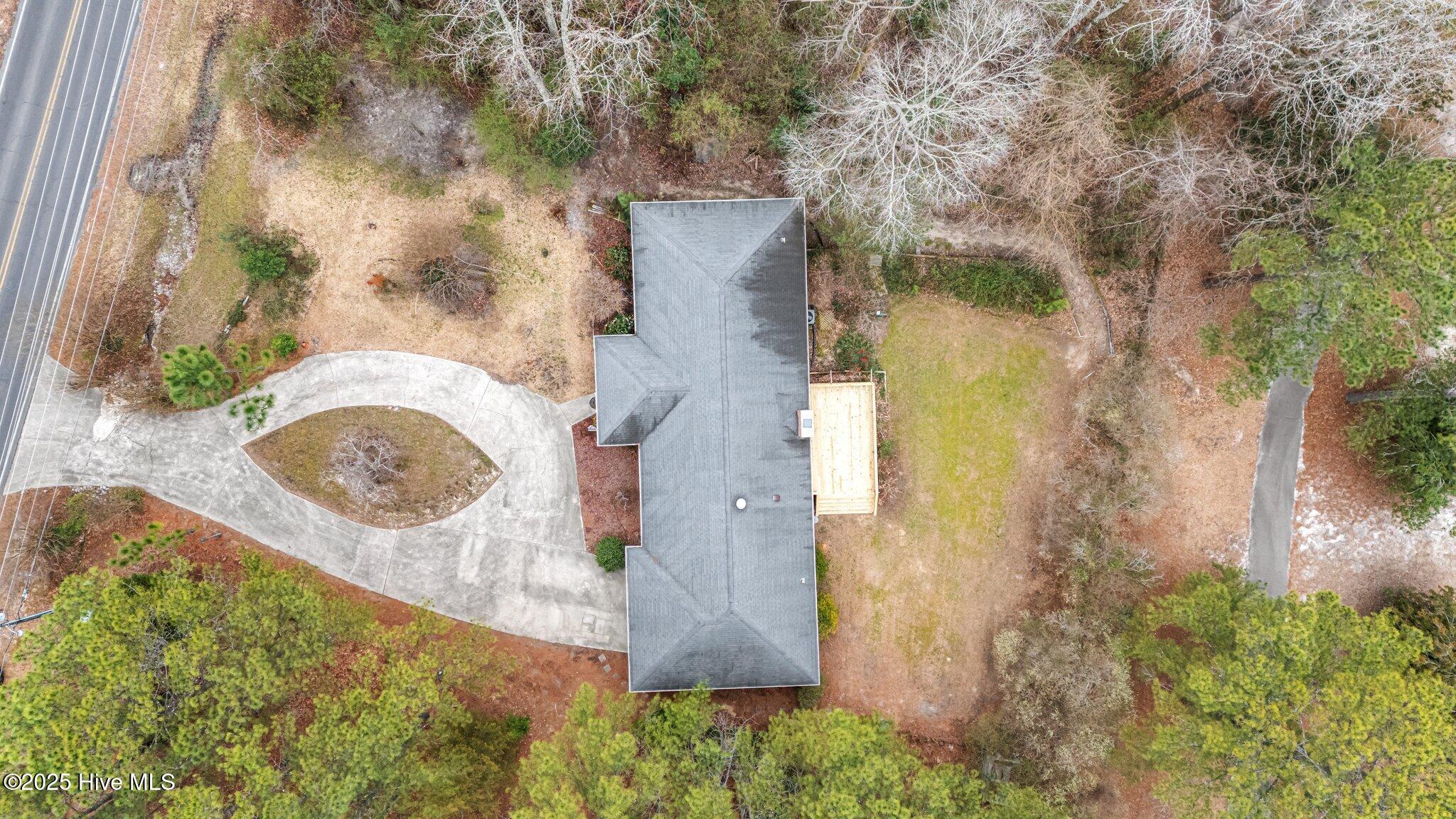 4094 Niagara Carthage Road Whispering Pines, NC 28327 - Photo 53 of 57 Aerial view of home. GOlf course is to the right in this view.