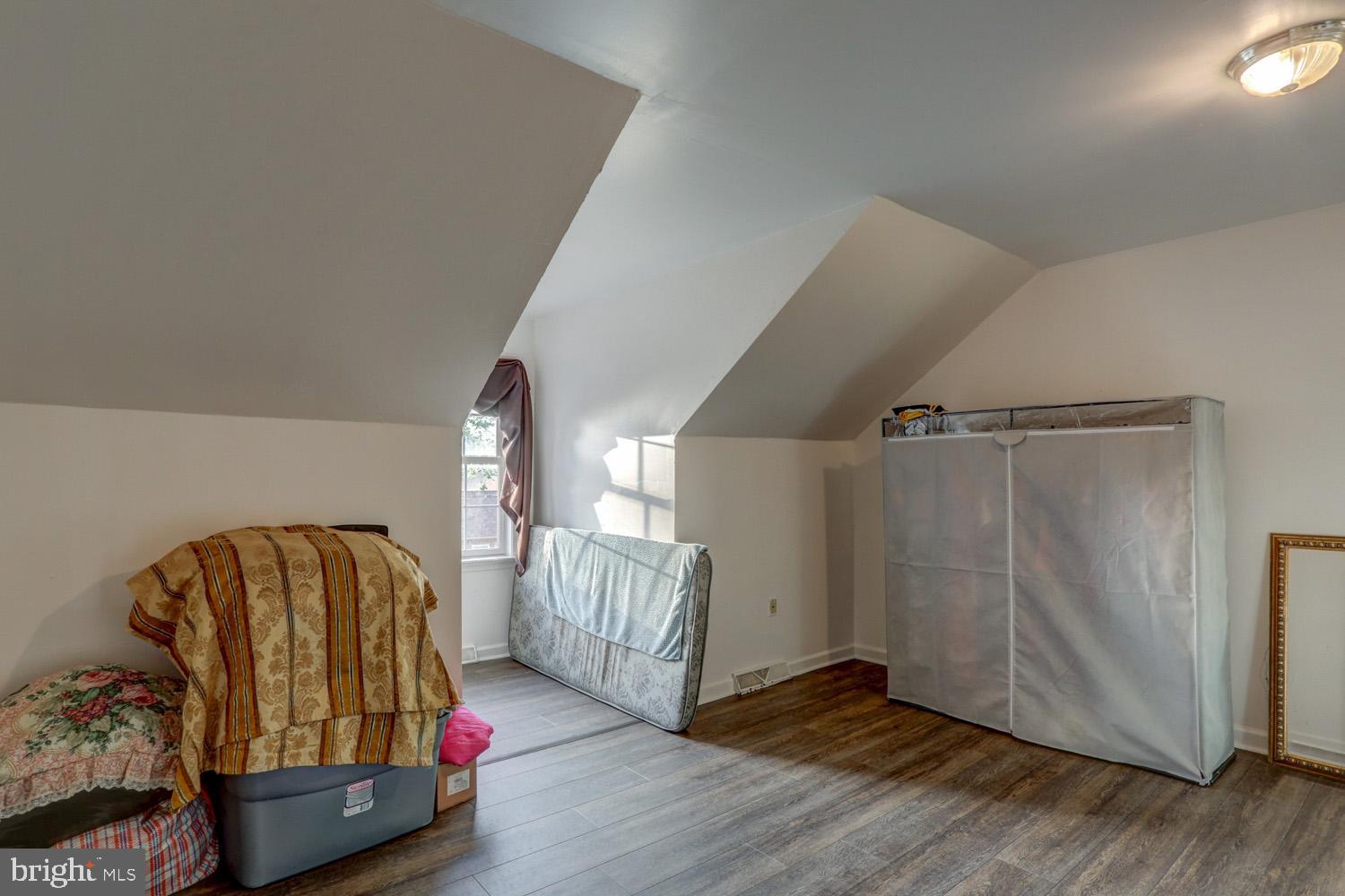 417 Green Street Lancaster, PA 17602 - Photo 35 of 37 a view of a livingroom with wooden floor and stairs