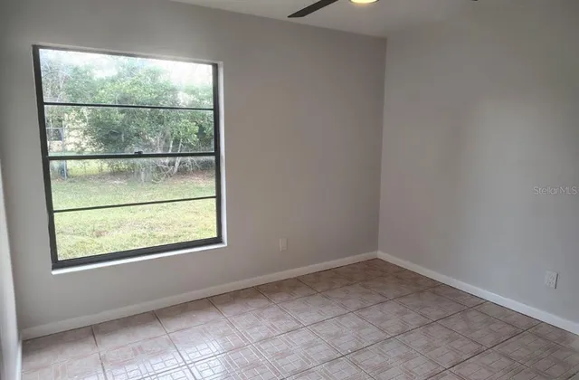 an empty room with a window