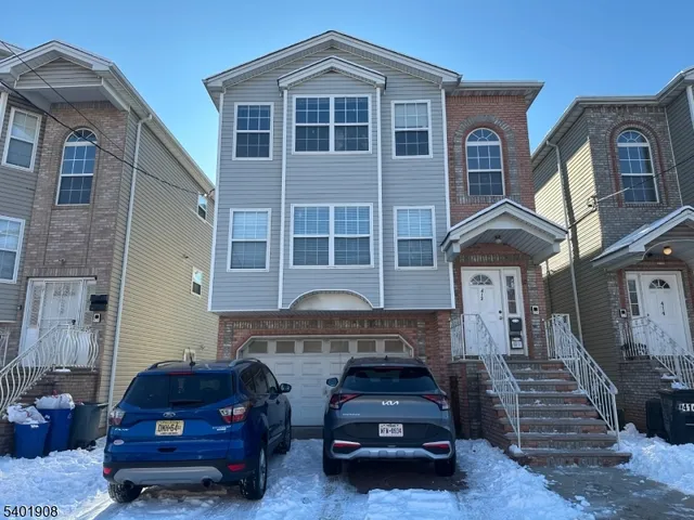 a car parked in front of a house