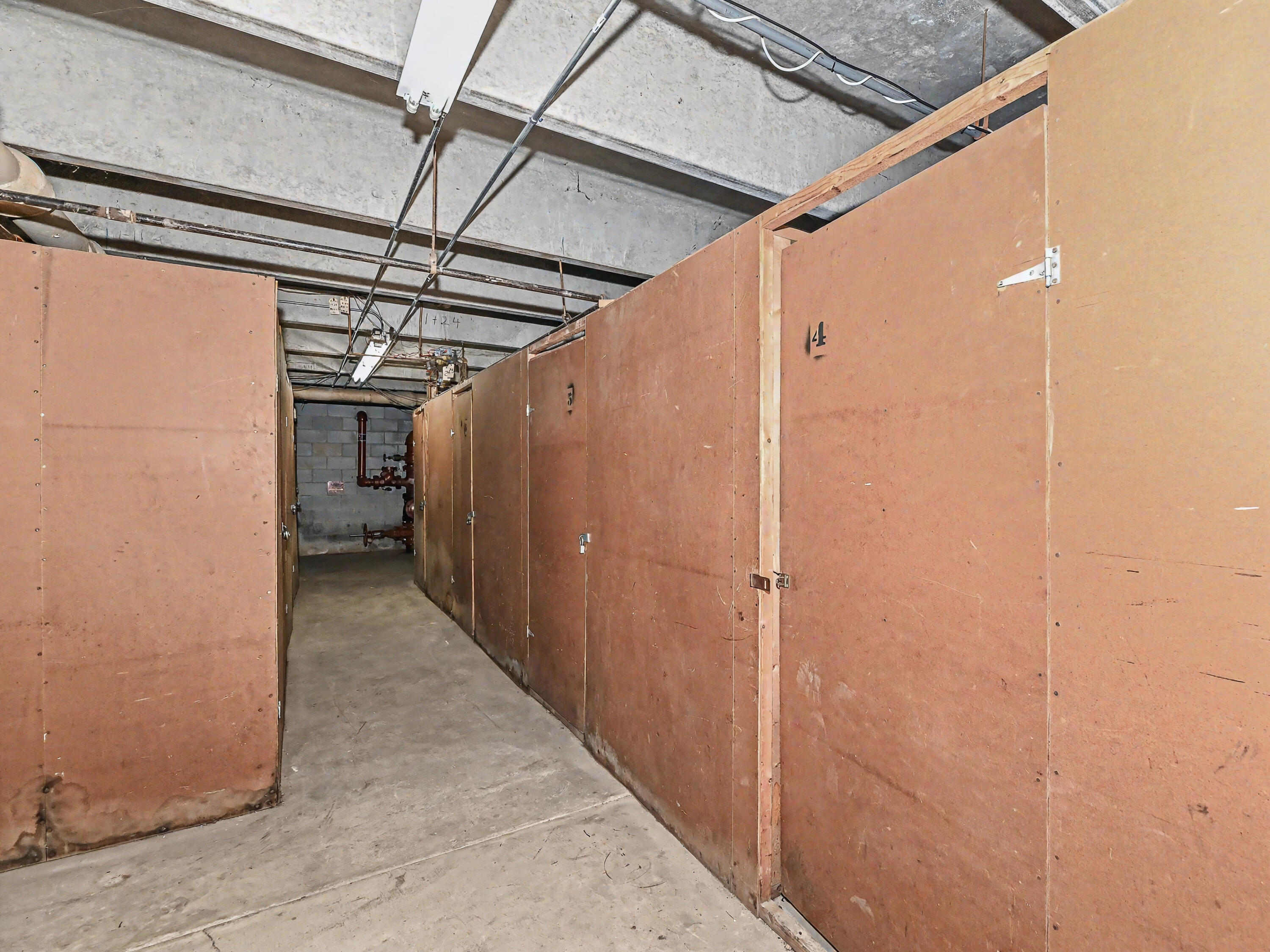 11926 West Mill Road, Unit 4 Milwaukee, WI 53225 - Photo 23 of 40 storage locker located in garage