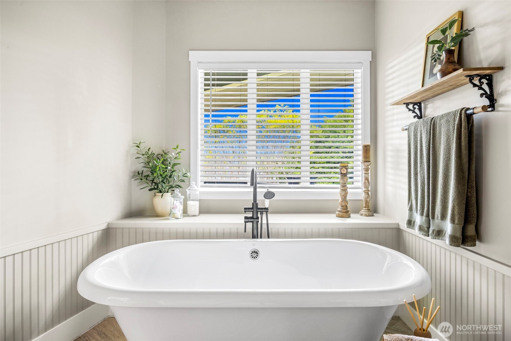 6591 Northeast North Shore Road Belfair, WA 98528 - Photo 25 of 37 a bathroom with a sink and a bathtub