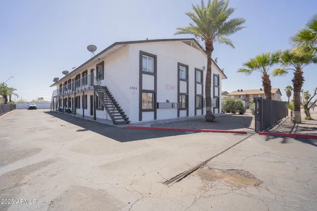 a view of car parked in front of house