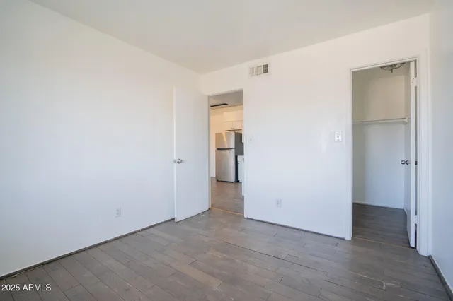 a bathroom with a toilet and a sink